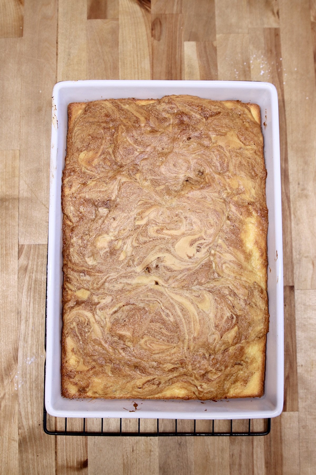 cake cooling on a wire rack