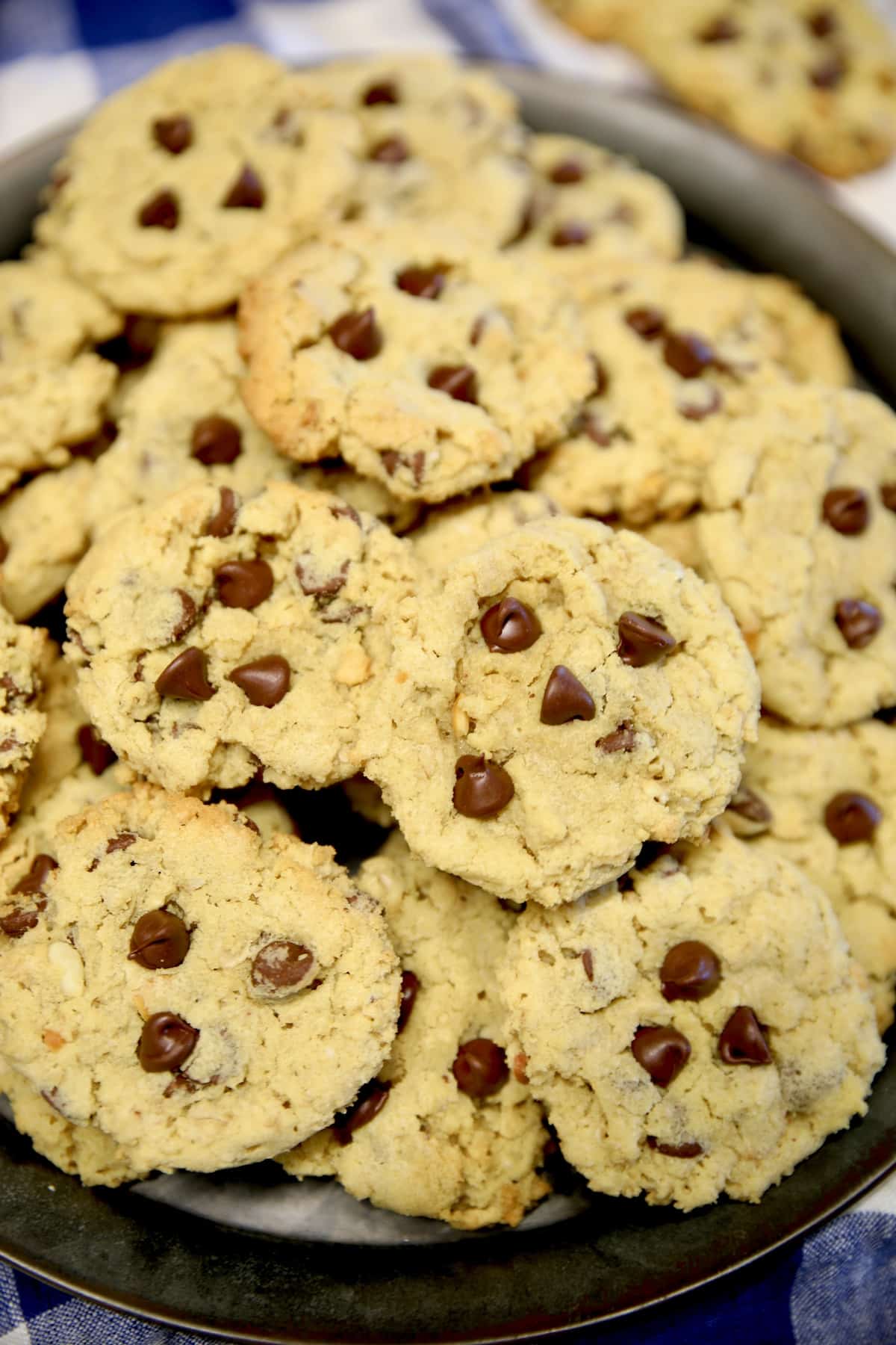 Peanut butter cookies with chocolate chips on a plate.