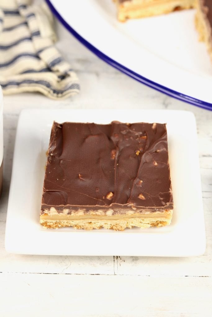 Chocolate Toffee Bars slice on a white plate