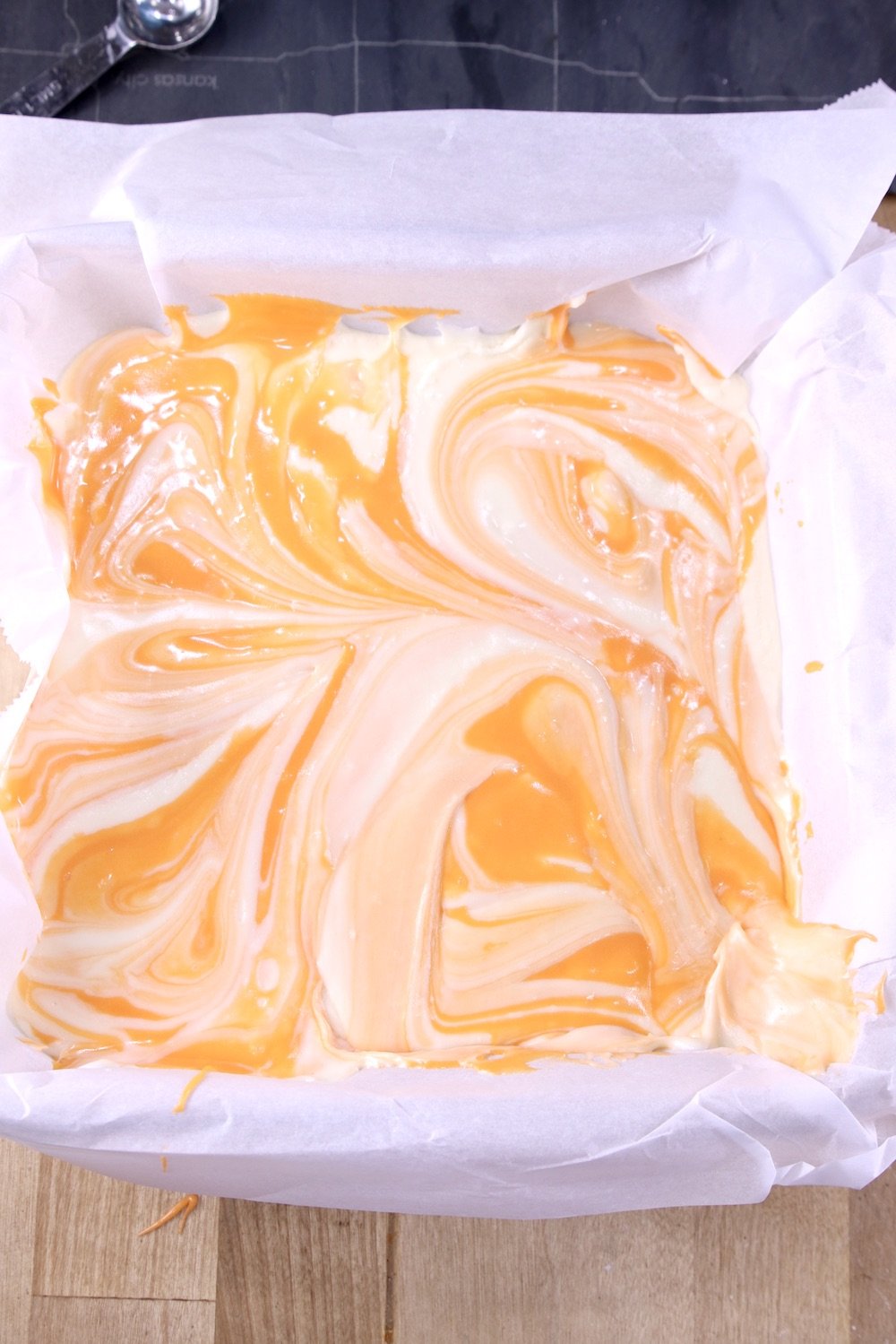 Marbled Orange Cream Fudge in a pan