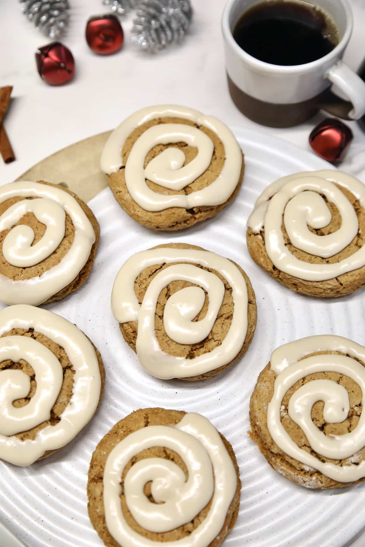 Gingerbread scones on a tray with cup of coffee.