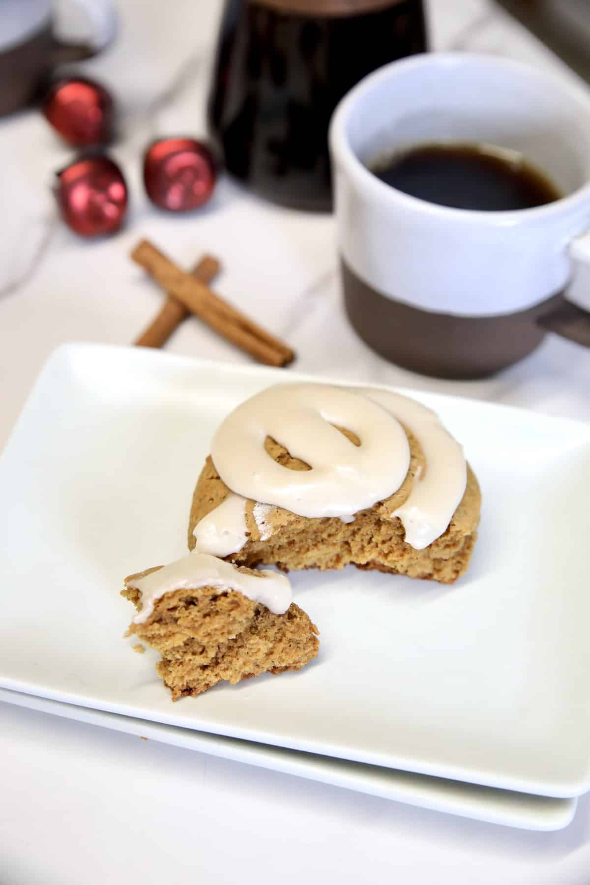 Scone on a plate with bite of the scone.