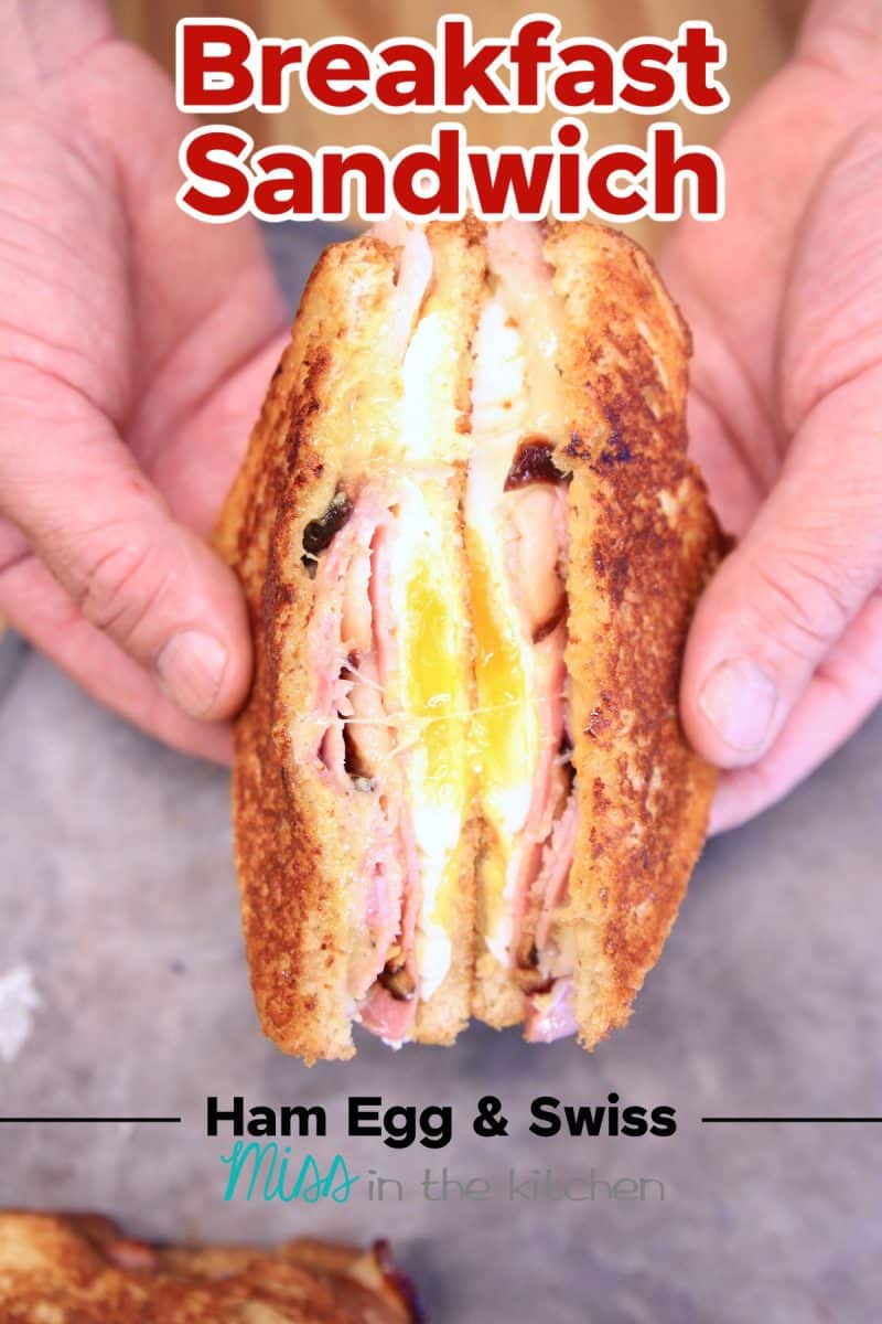 Breakfast sandwich, cut in half. Text overlay.