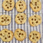 Chocolate chip cookies on a wire rack.