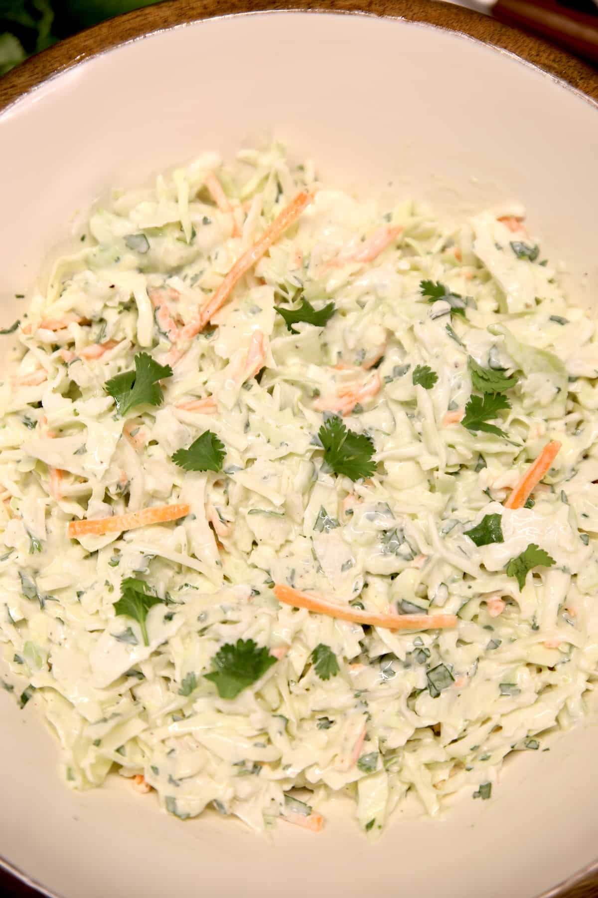 Bowl of cilantro lime slaw, close up.