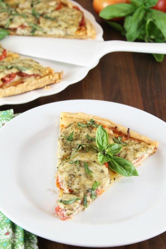 Tomato Pesto Tart Recipe from Southern Living Magazine. A summer favorite appetizer ~ MissintheKitchen.com