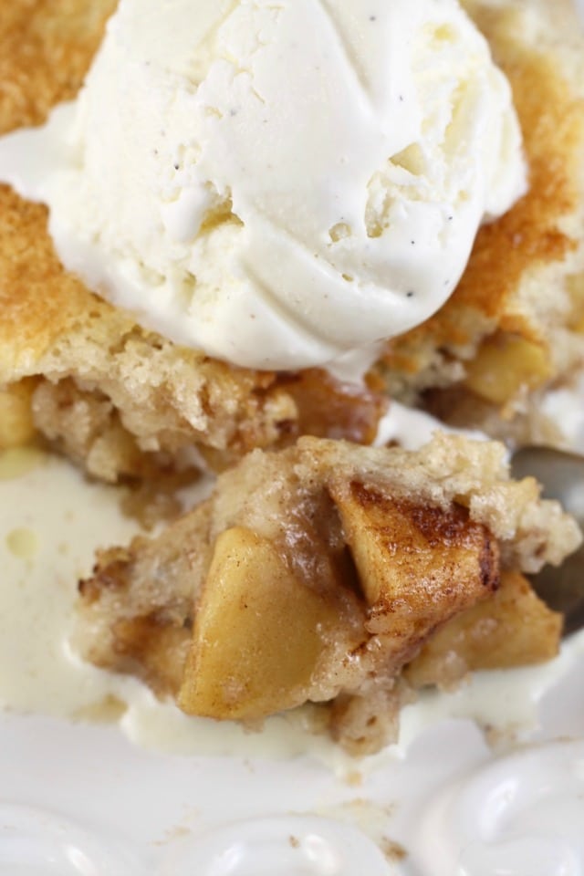Closeup of apple cobbler with vanilla ice cream.
