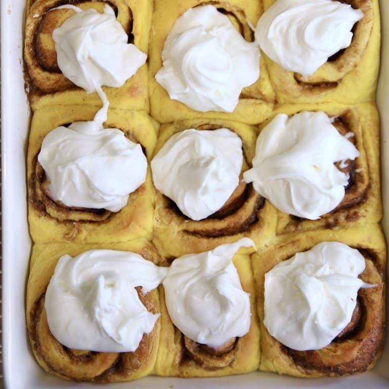 Pumpkin Cinnamon Rolls with cream cheese icing.
