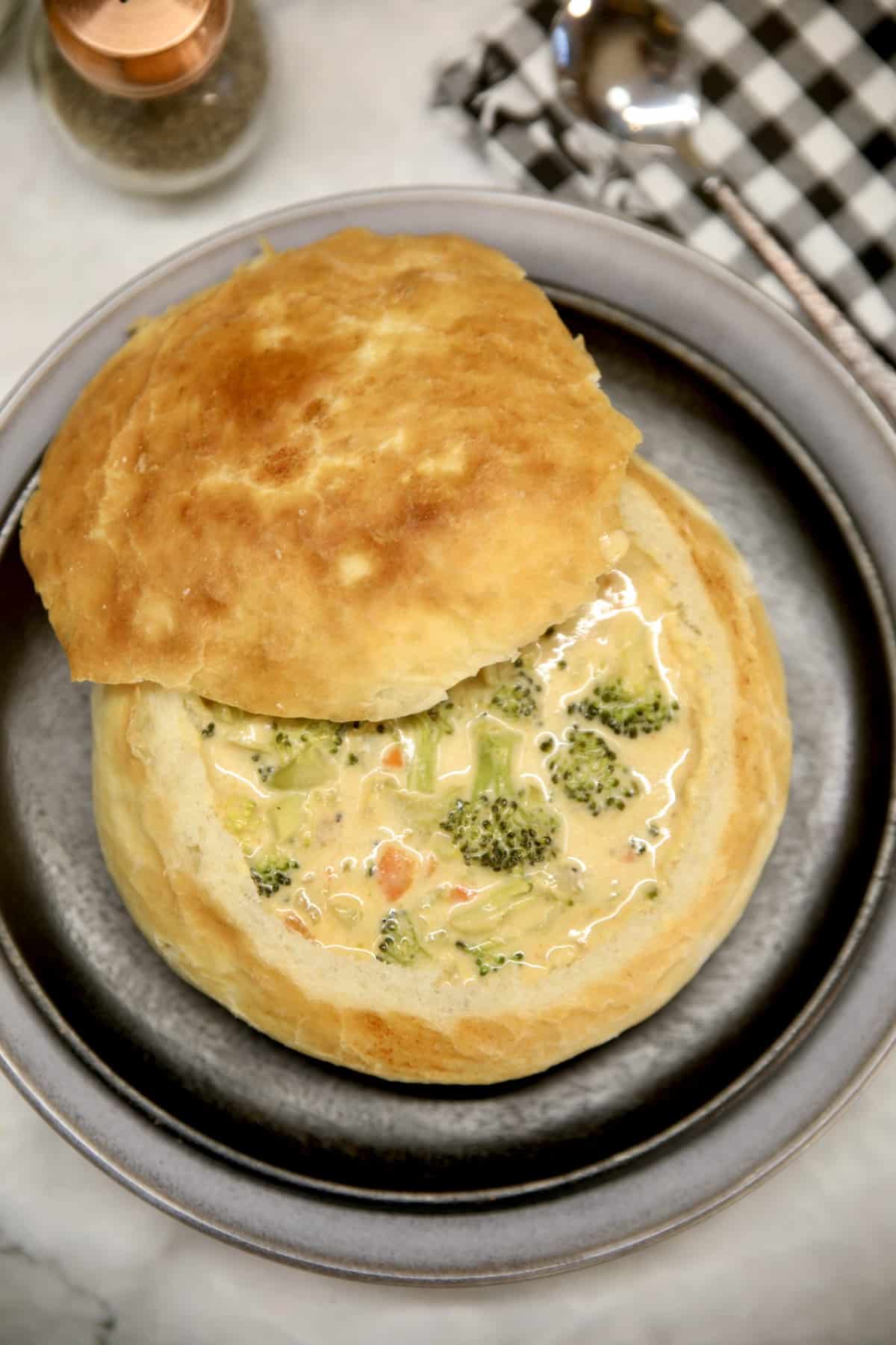 Broccoli cheese soup in a bread bowl.
