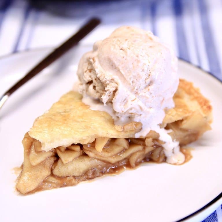 Slice of apple pie with ice cream.