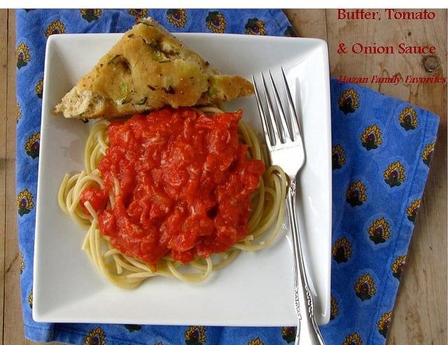 Pasta with Butter & Onion Sauce on plate with fork