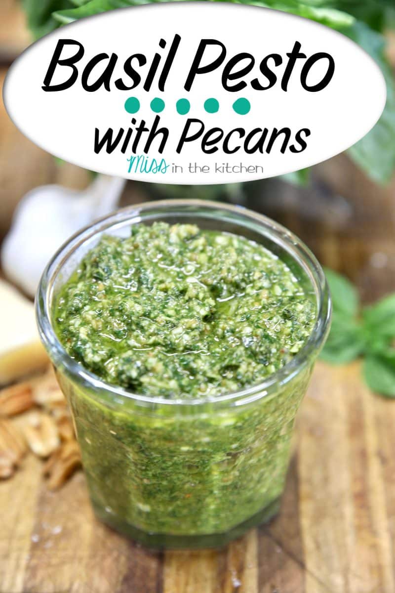 Basil Pesto with pecans in a jar - text ovelay.