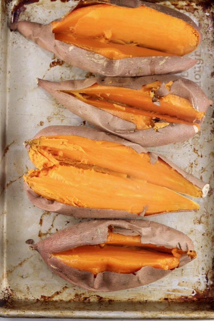 Whole Sweet Potatoes baked - split in half