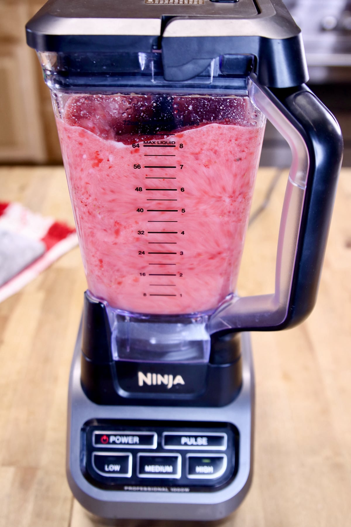 blending strawberry cocktail.