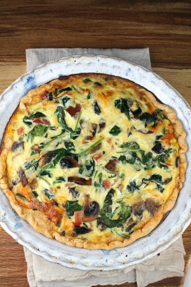 Ham, Spinach and Mushroom Quiche is a delicious recipe for any time of day and perfect for entertaining. From MissintheKitchen.com