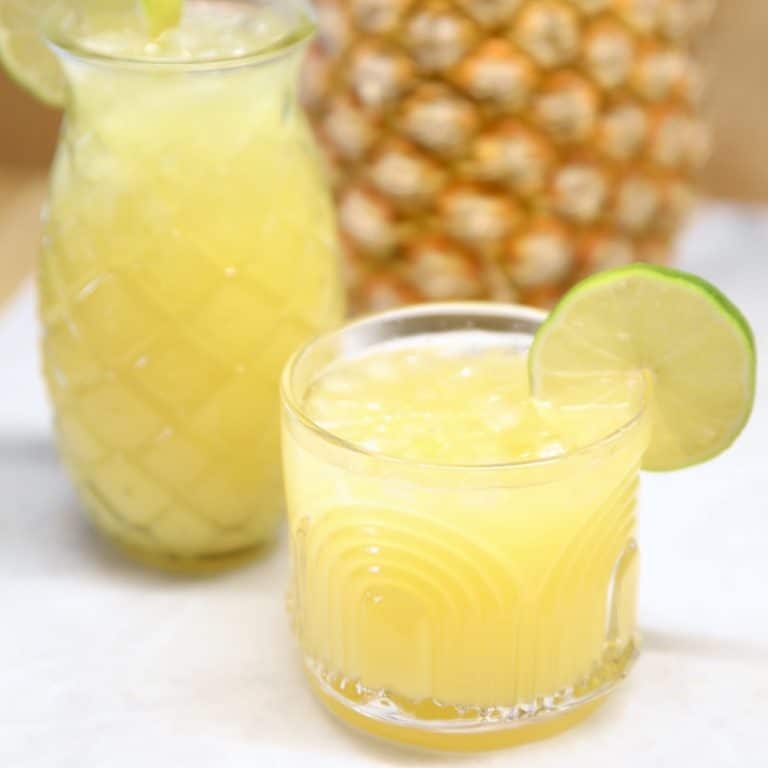 Pineapple margaritas in an old fashioned glass, tiki glass.
