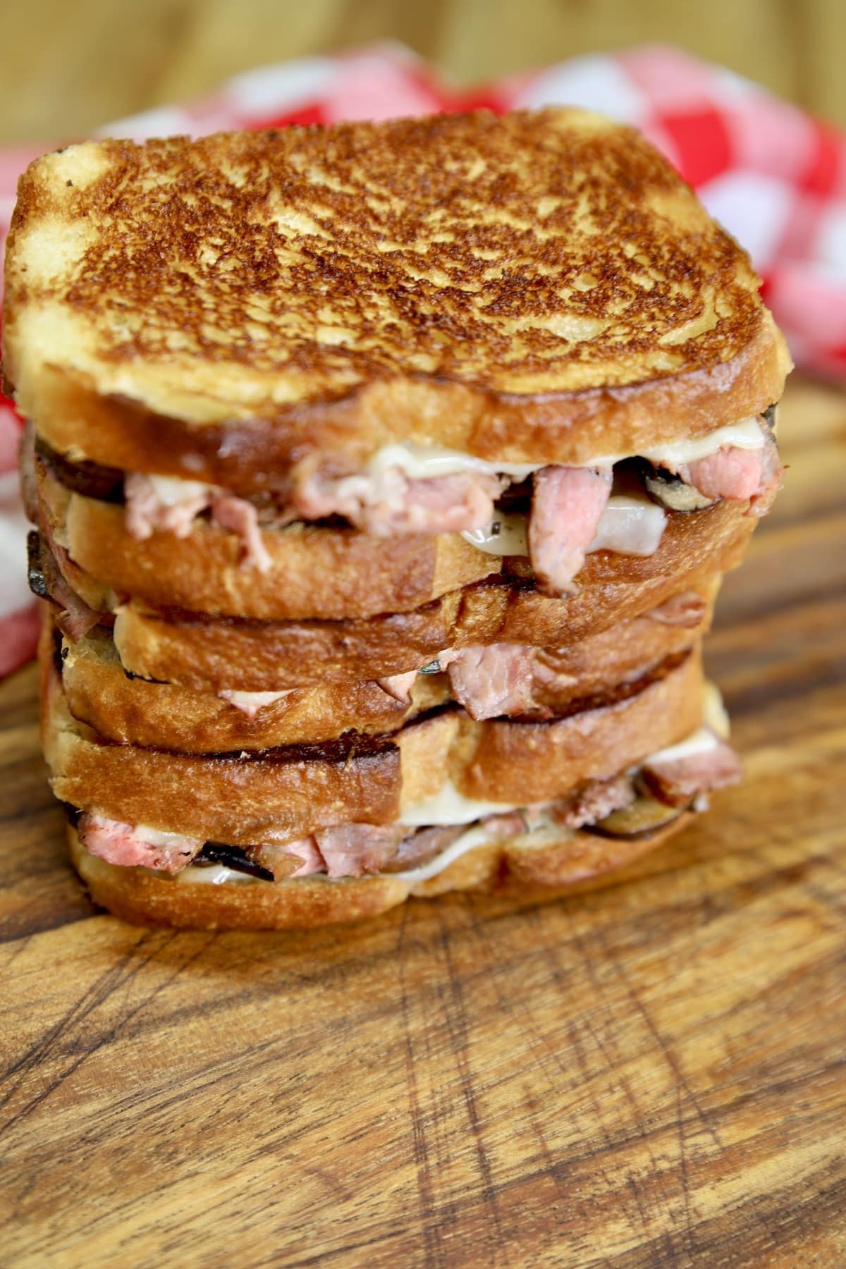 Stack of steak mushroom grilled cheese.