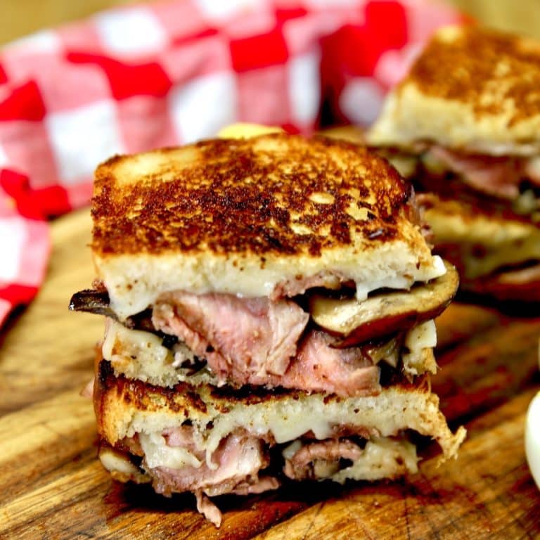 Steak mushroom swiss grilled cheese stacked