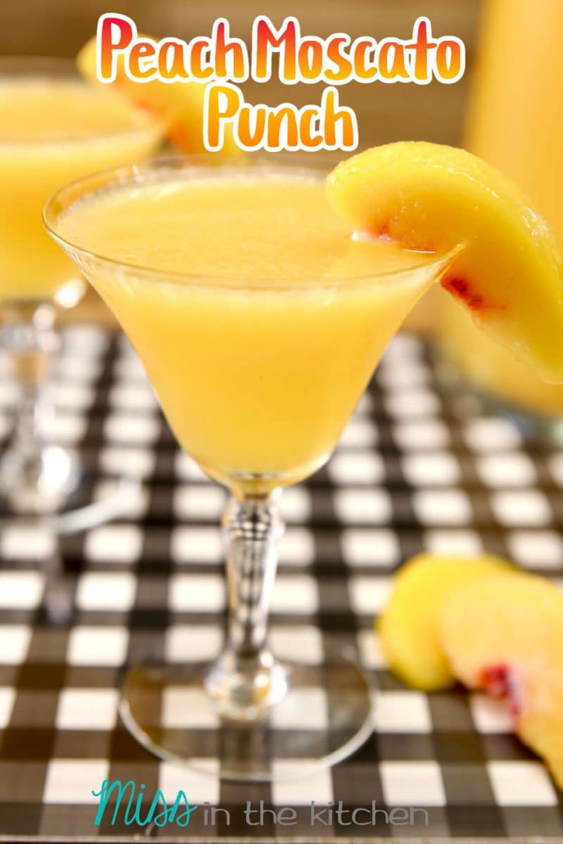 Peach Moscato Punch in a cocktail glass - text overlay.