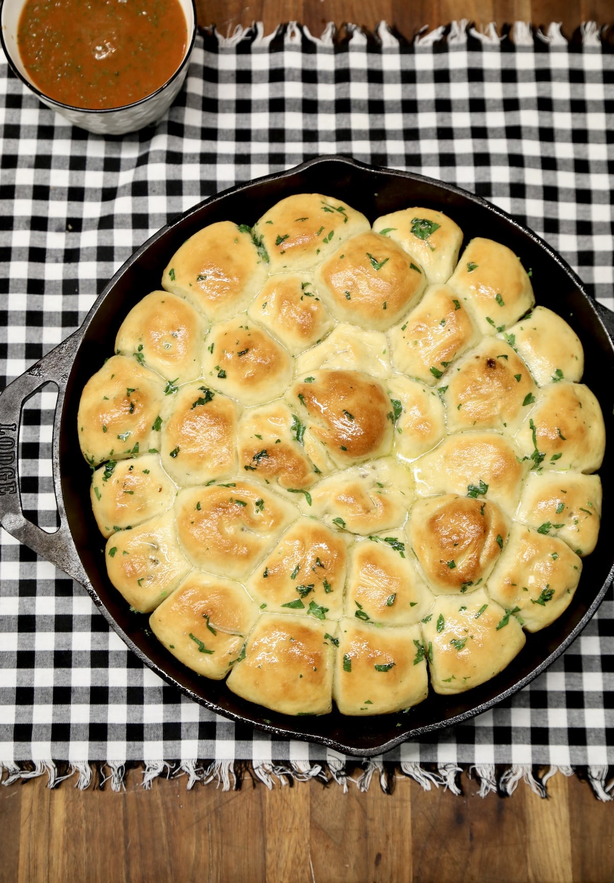 Meatball Poppers in a skillet with pizza sauce.