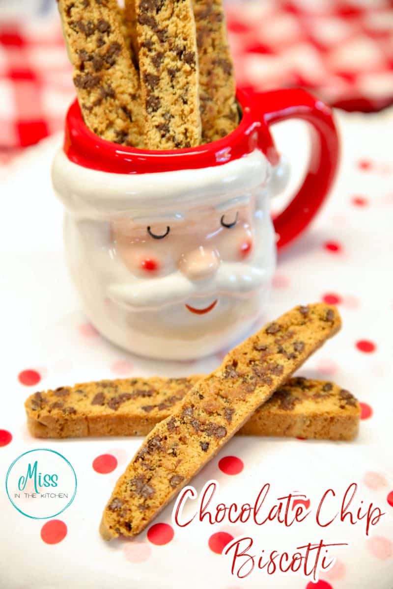 Chocolate chip biscotti in a Santa mug, text overlay.