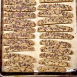 Sheet pan of chocolate chip biscotti.
