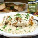 Slow Cooker Smothered Pork Chops with Sour Cream Sauce Dinner Recipe with Holland House WHite Cooking Wine from missinthekitchen.com
