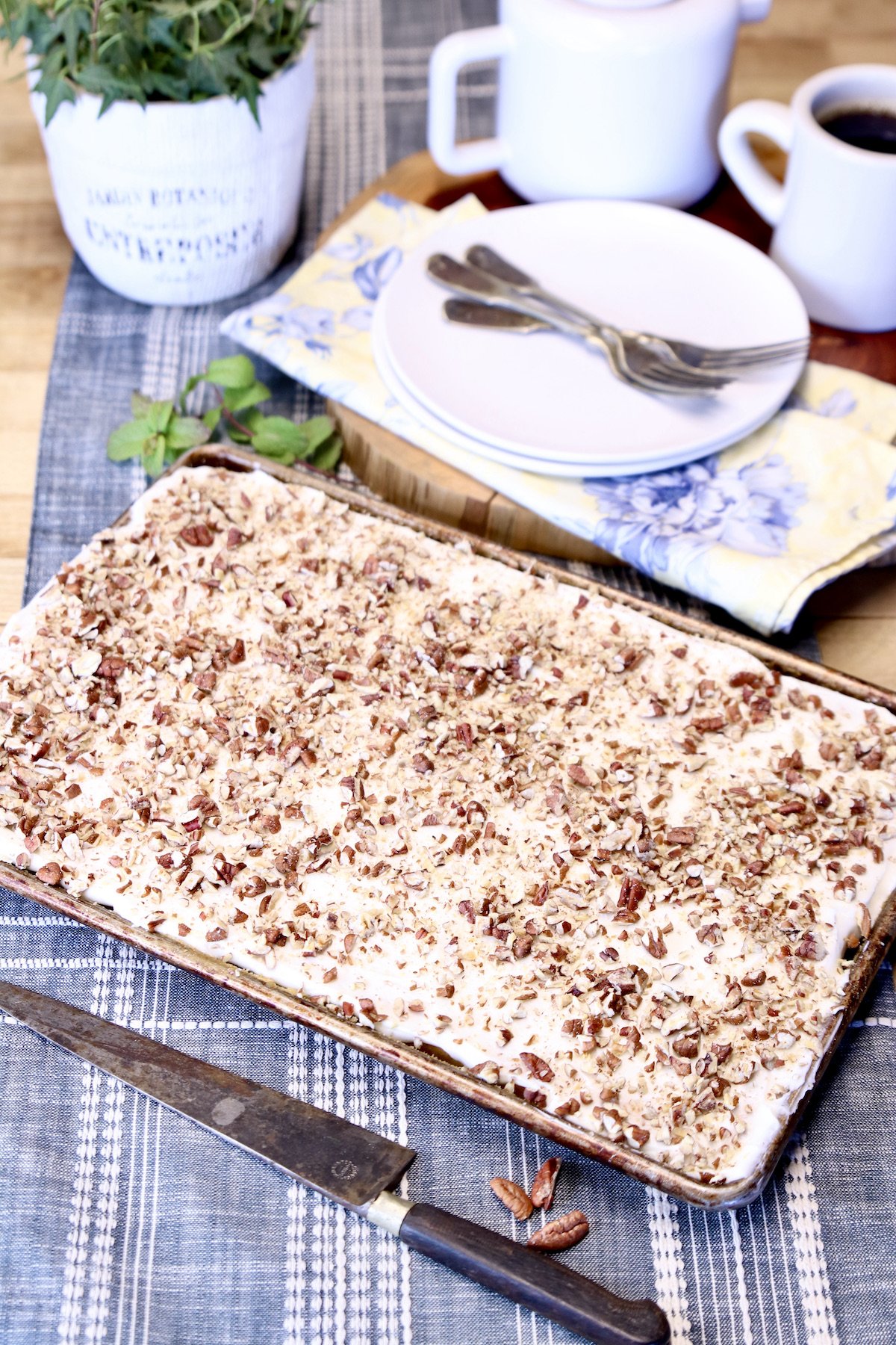 sheet cake with pecans - dessert plates, forks