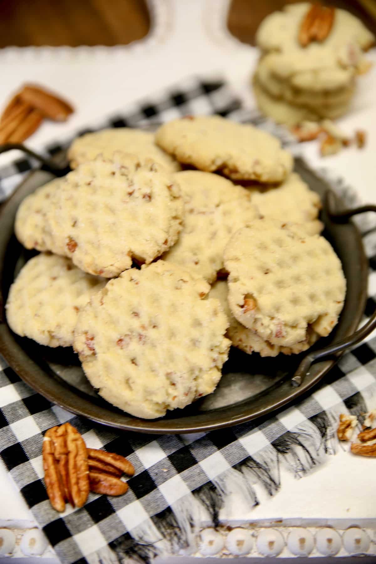 Plate of pecan sandies cookies. 