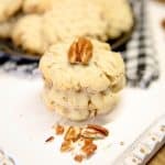 Stack of pecan sandies cookies.