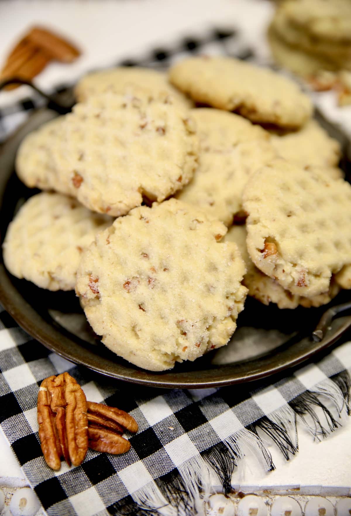 Plate of pecan sandies cookies.