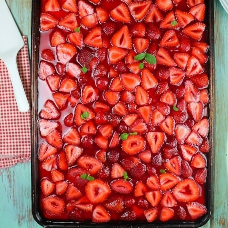 Strawberry slab pie in a sheet pan.