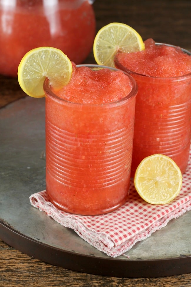 Strawberry Lemonade Moscato Slushie Cocktail garnished with Lemon Slices