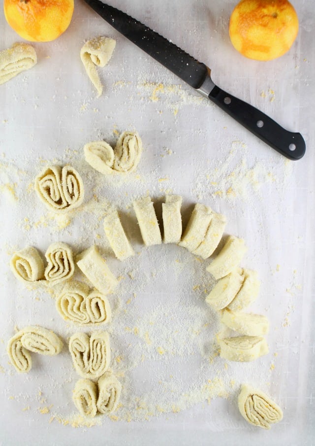 Orange Scented Palmiers Sliced and Ready for the Oven from MissintheKitchen.com