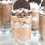 No Bake Chocolate Cheesecake layered with cookies and cream filling in individual servings for a decadent and delicious dessert for any night of the week | MissintheKitchen.com