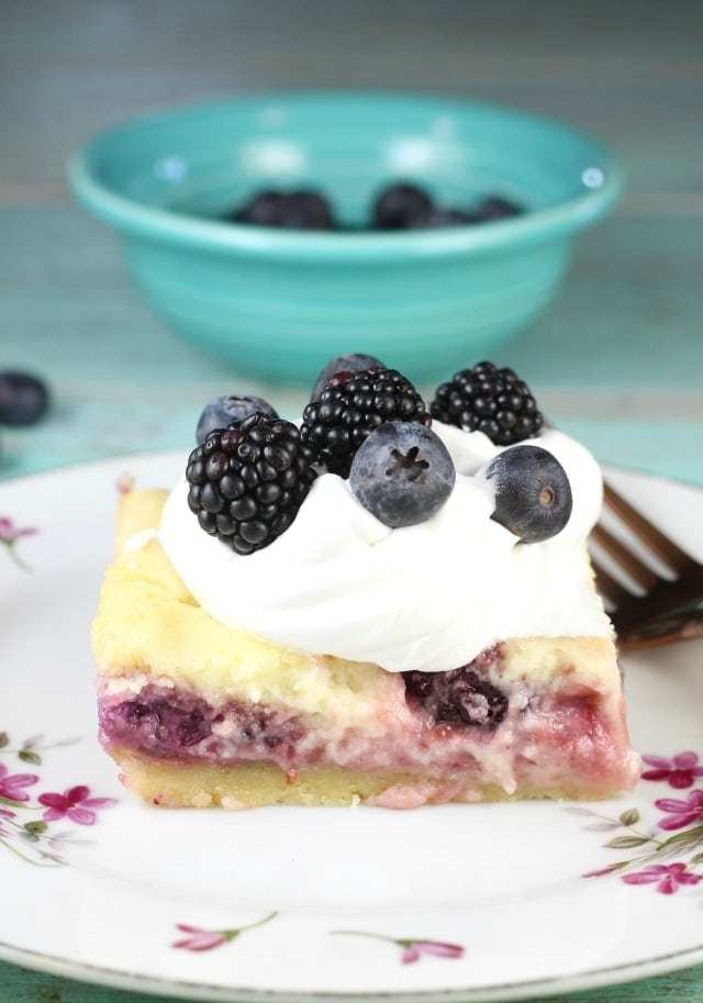 Berry Cheesecake Bars Recipe for an easy dessert any day of the week. From MissintheKitchen.com