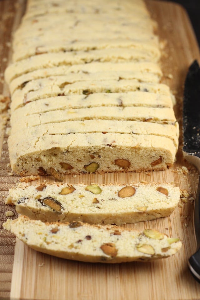 Slicing Lemon Pistachio Biscotti Recipe ~ MissintheKitchen.com