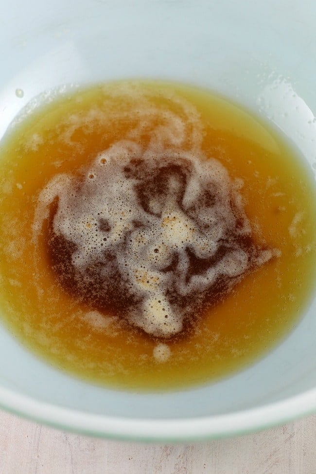 Bowl of browned butter for salted caramel cookie bars