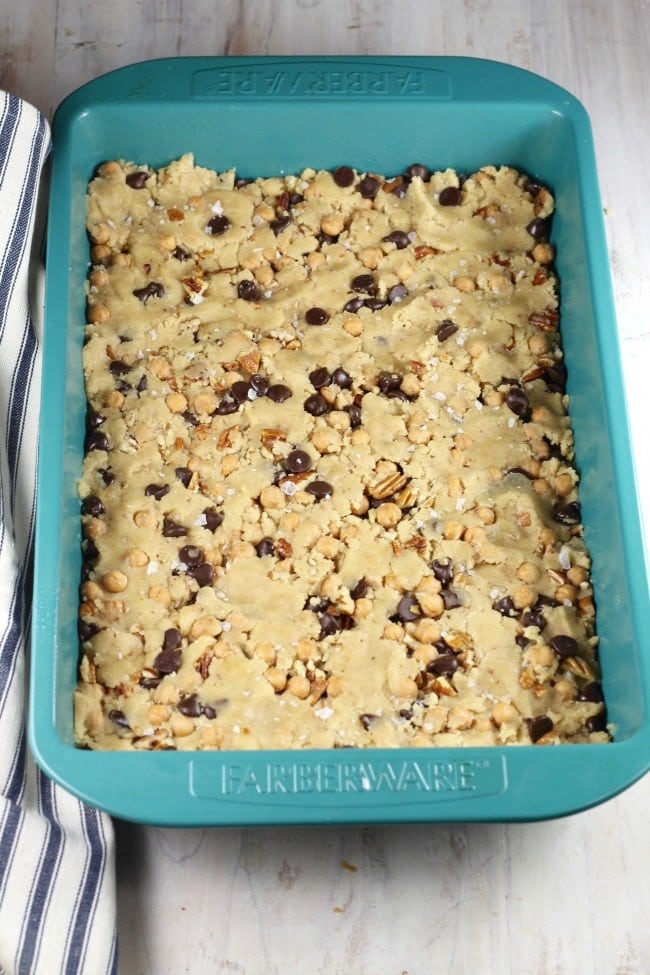 salted caramel cookie bars dough pressed into 9 x 13 pan