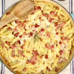 Baked ham penne pasta casserole.