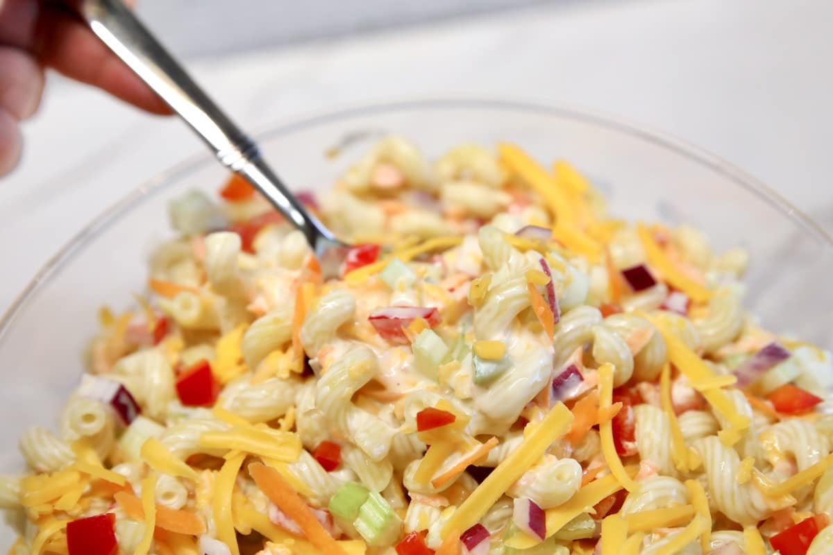 Spoonful of pasta salad.