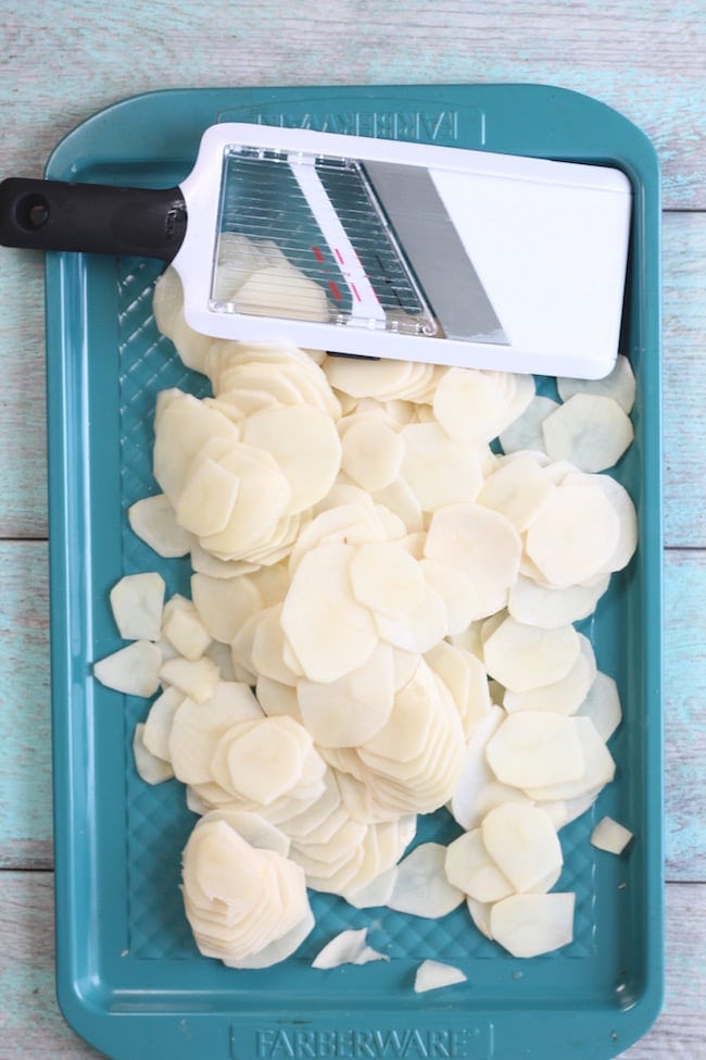 Mandoline and sliced potatoes for Ham Potato Casserole