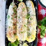 Easy Grilled Mexican Corn with cilantro and cotija cheese