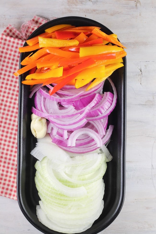 Sliced sweet peppers and onions for fajita burgers