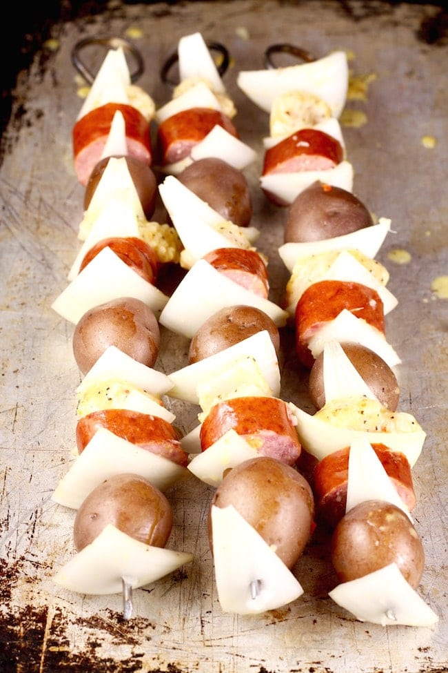 Sheet pan with Chicken, Smoked Sausage, Onions and Potato Kabobs