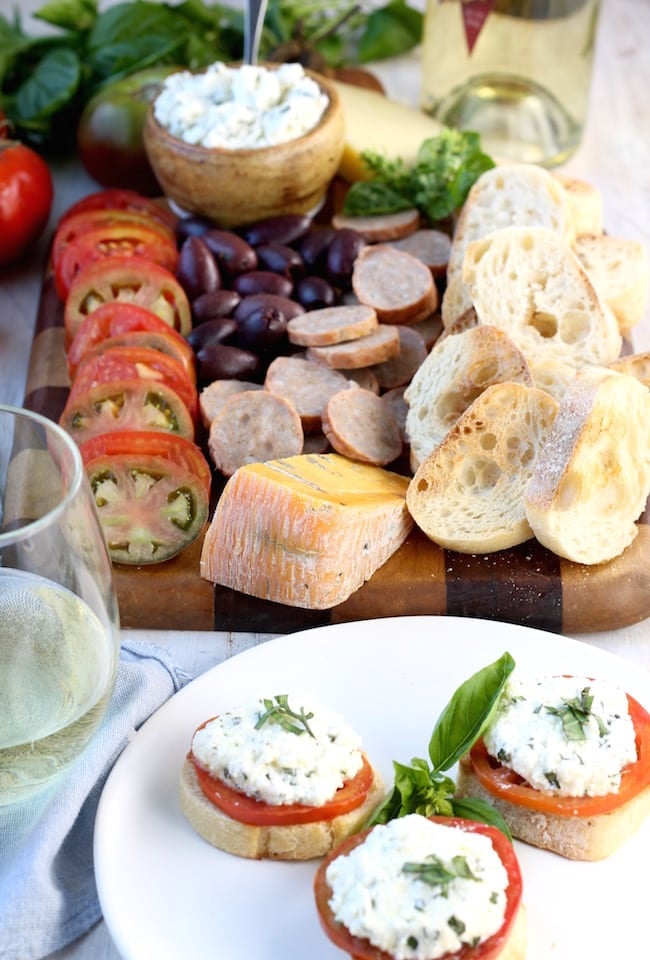 Tomato and Herbed Ricotta Bruschetta with wine and cheese