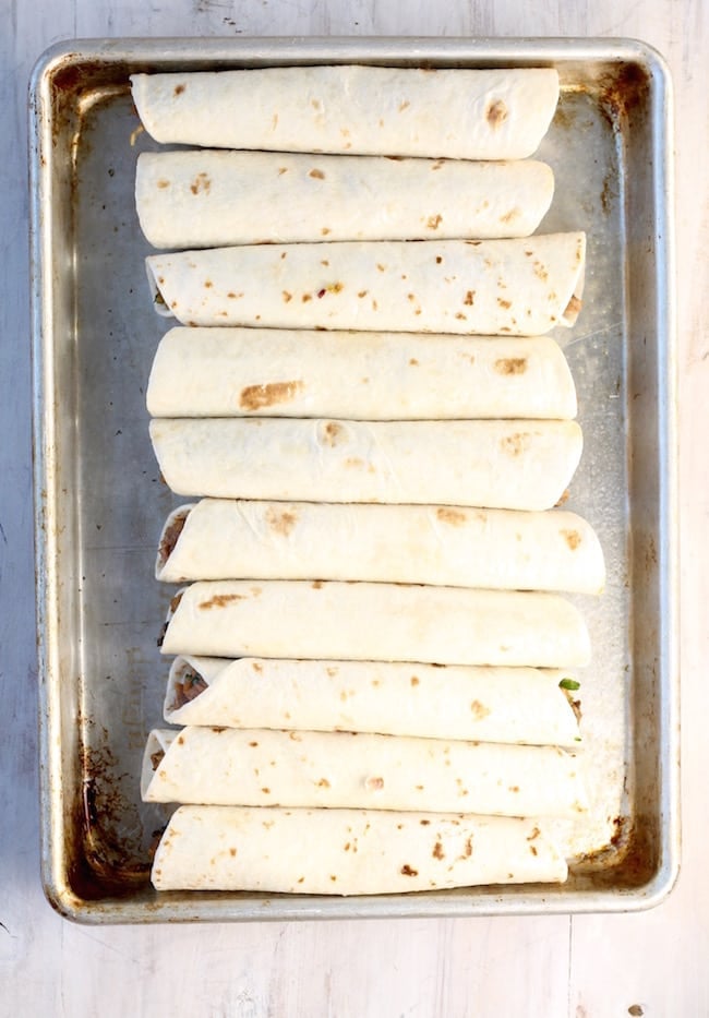 Pan of Brisket Taquitos ready for the oven