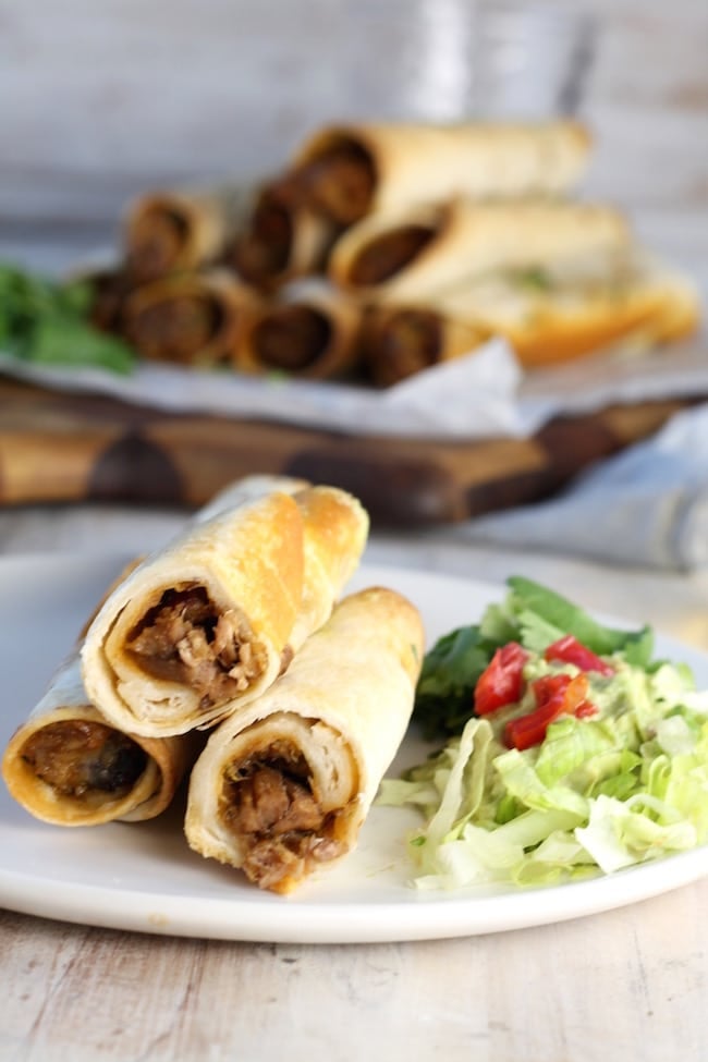 Brisket Tacos with lettuce and tomatoes
