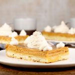 Pumpkin Pie Bars topped with whipped cream