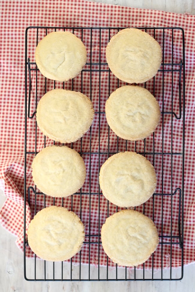 Wire cooling rack with the Best Ever Sugar Cookies and a gingham napkin